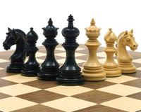 The Garvi Ebony Chessmen set on a chessboard, featuring expertly crafted Staunton pieces with Mughal influence, made from ebony and boxwood.